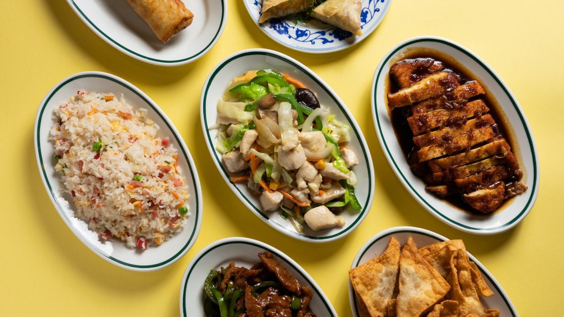Typical Chinese food on yellow background